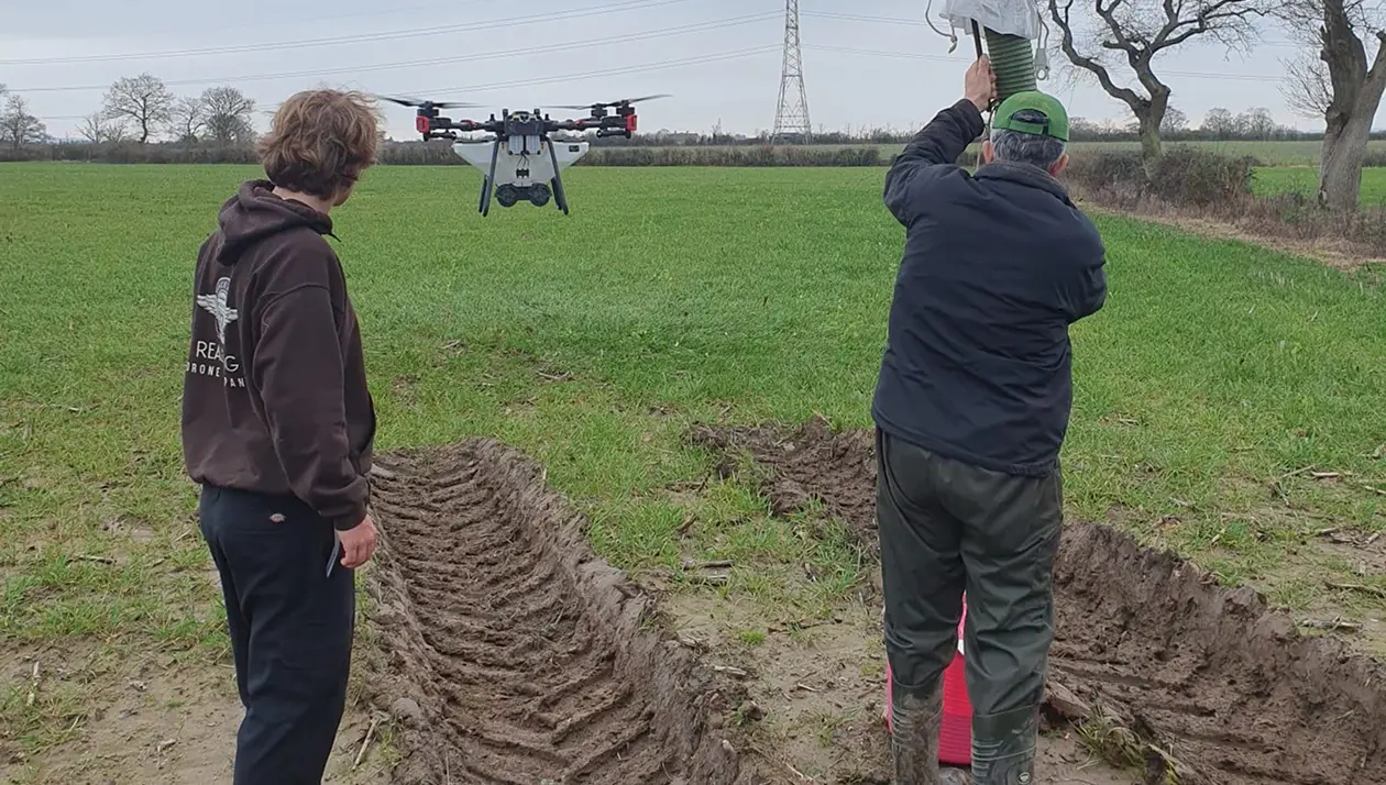 Tractor wheel ruts showing soil compaction damage in an arable field