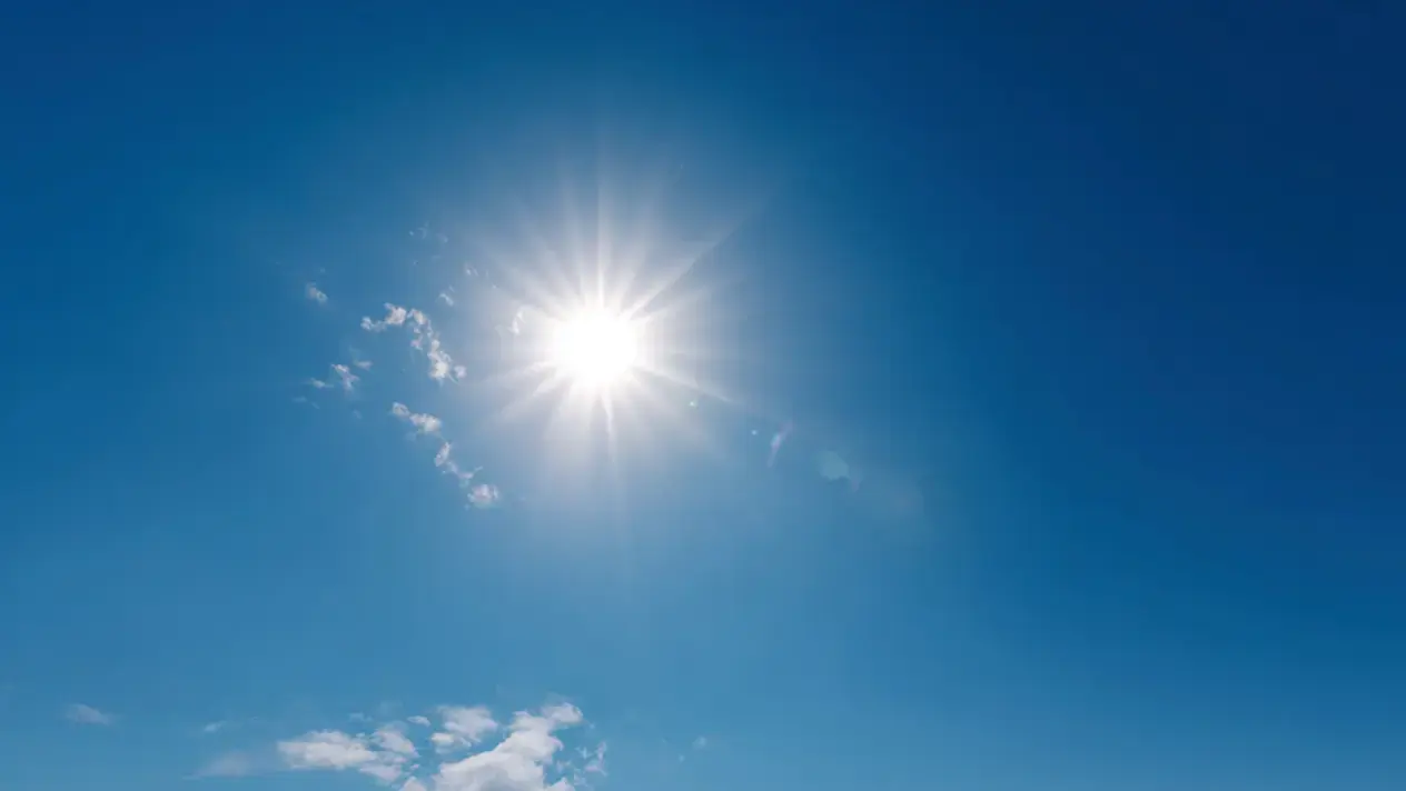 The sun on a bright sunny day.
